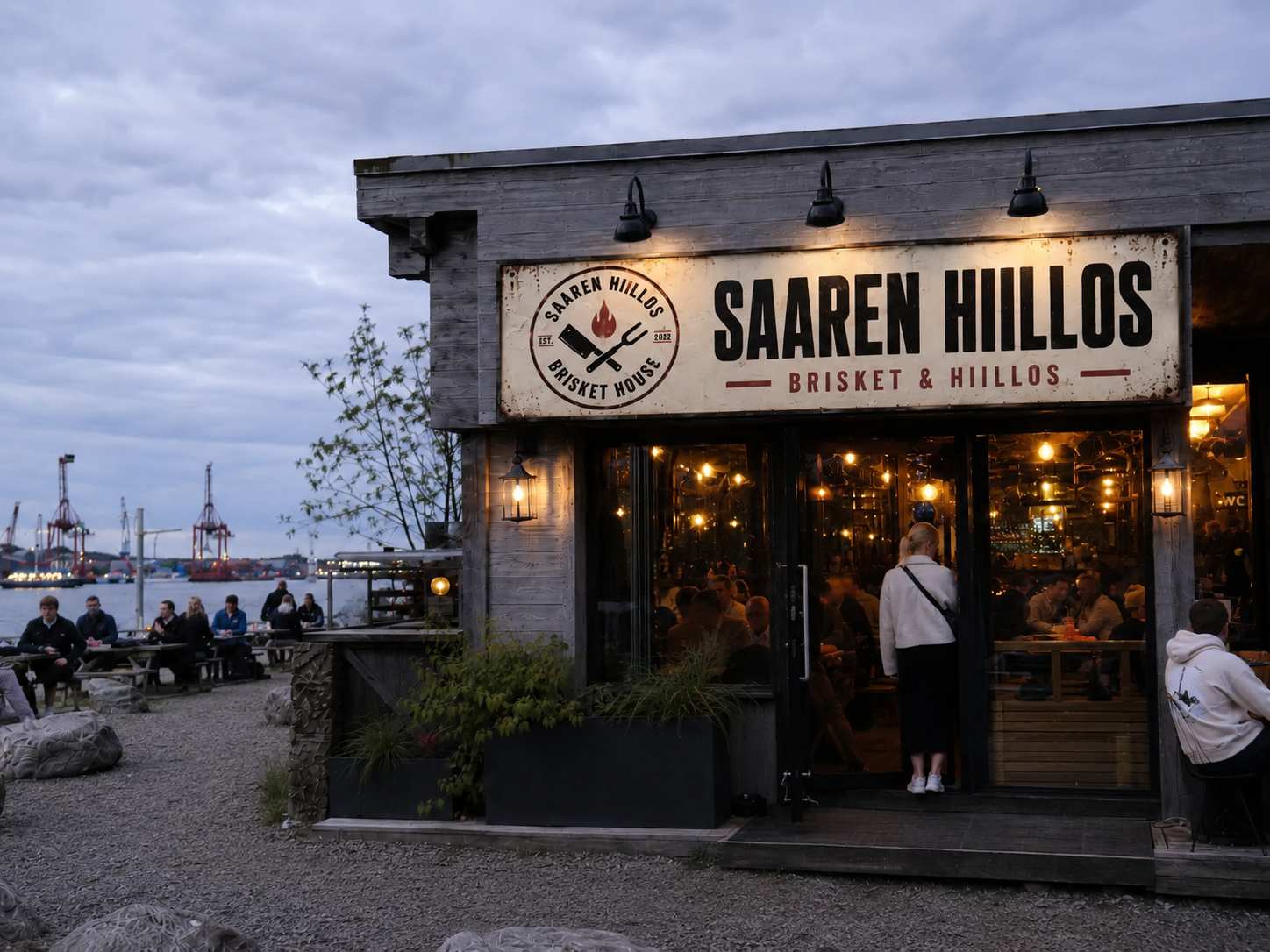 Saaren Hiillos restaurant storefront and sign on the harbour pier